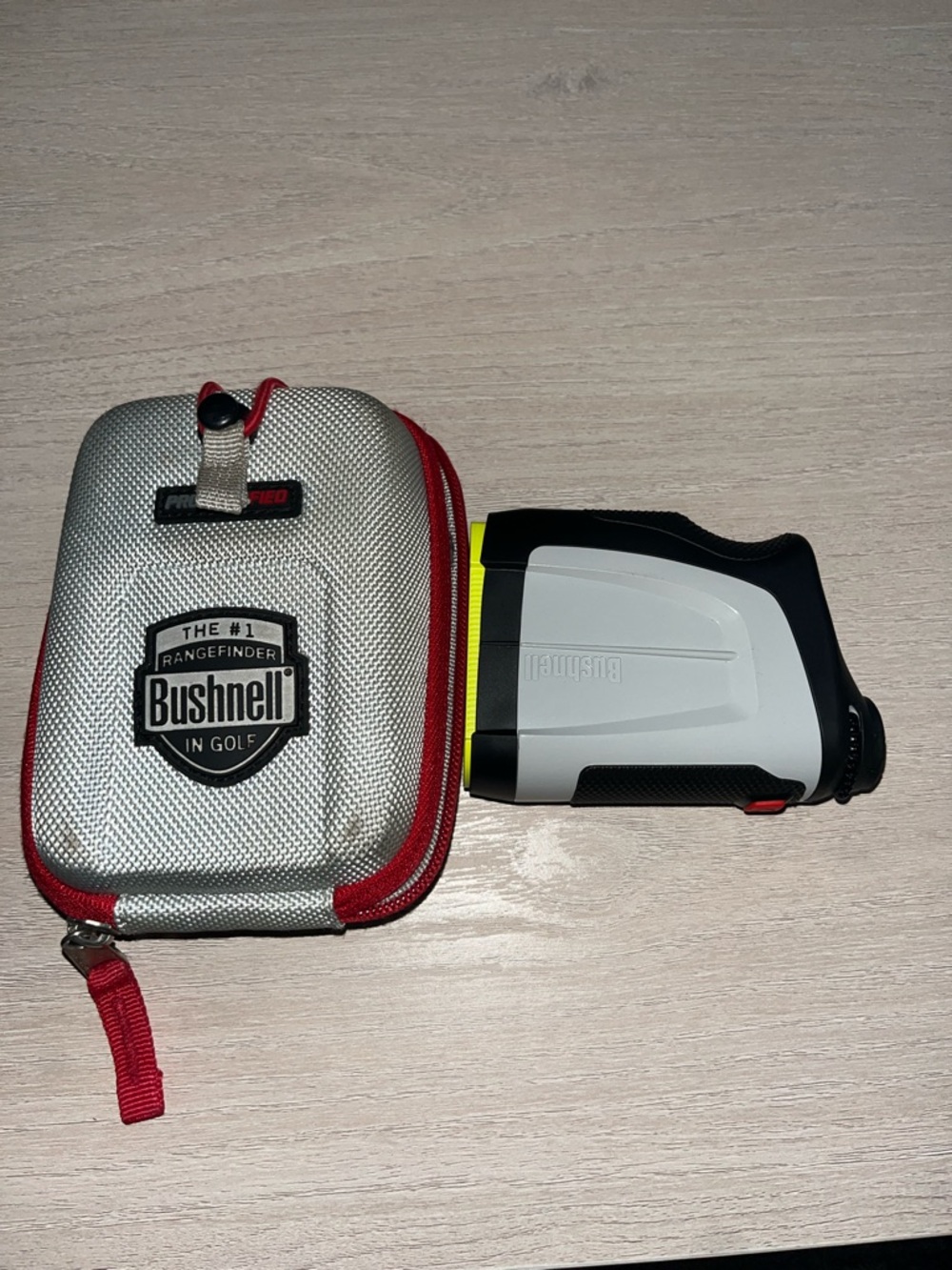 Bushnell White and Black Golf Rangefinder with Silver Carry Case